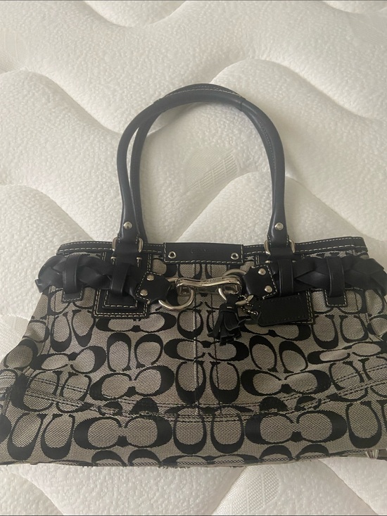 Coach Handbags - Coach Black and Tan Signature Canvas Tote with Leather Handles